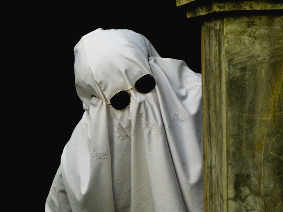 a statue of a person wearing a mask