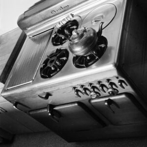 Vintage stove with a kettle on top